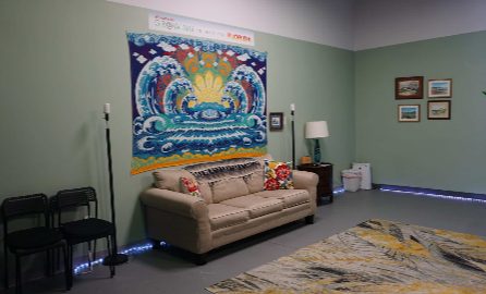 The studio room in the same space, set up with seating